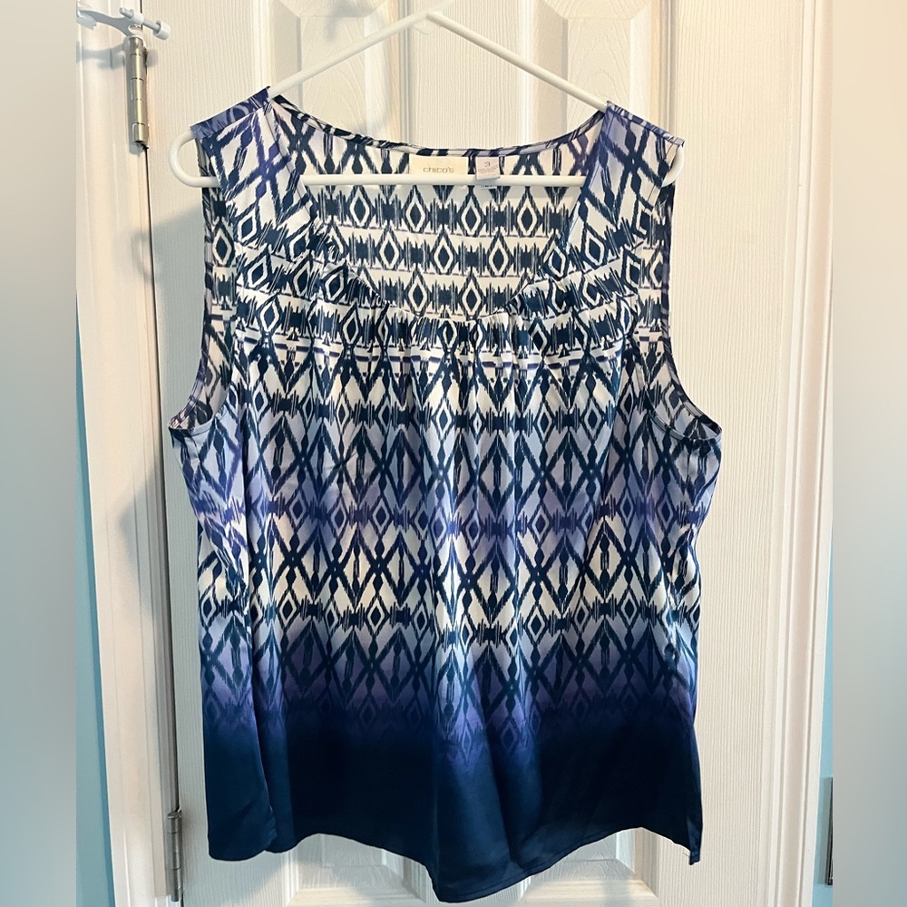 Gently used sleeveless blouse-size 3 which is 14-16
